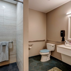 Spacious bathroom with shower and counter