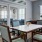 a dining room table with chairs around it