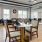 a large room with tables and chairs