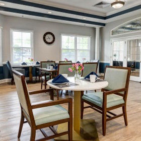 a large room with tables and chairs